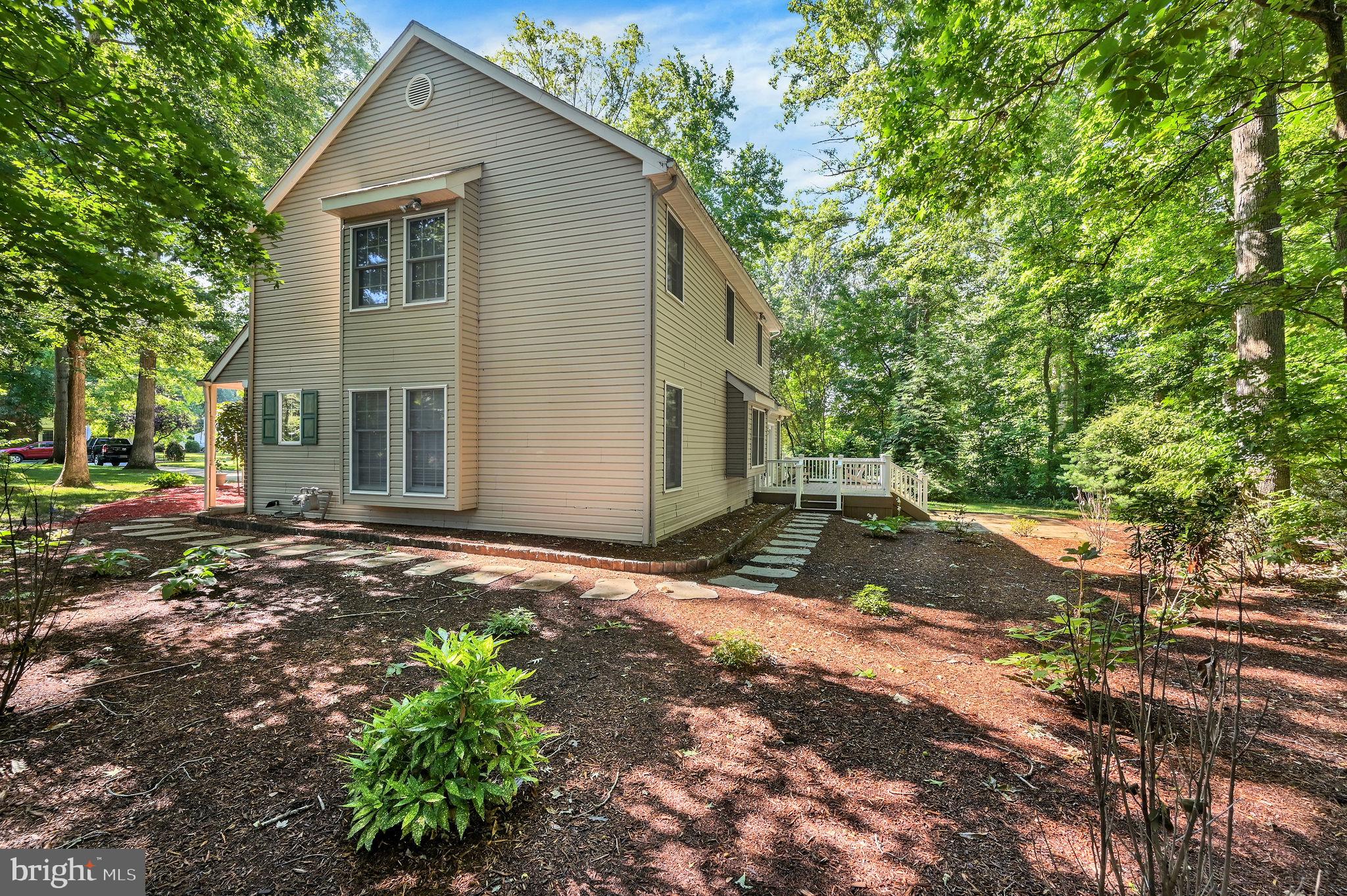 176 Burning Tree Road Dover, DE 19904 - Photo 4 of 33 Serene home nestled in lush greenery.