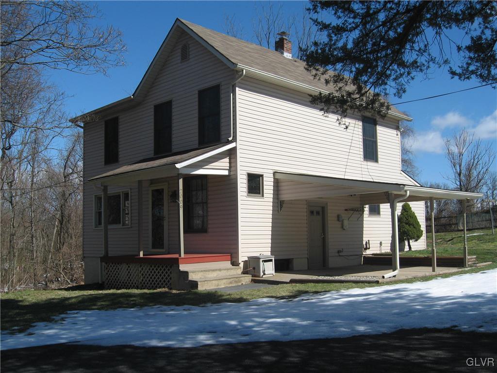 2009 Springtown Hill Road Hellertown, PA 18055 - Photo 1 of 39 a view of a house with a yard