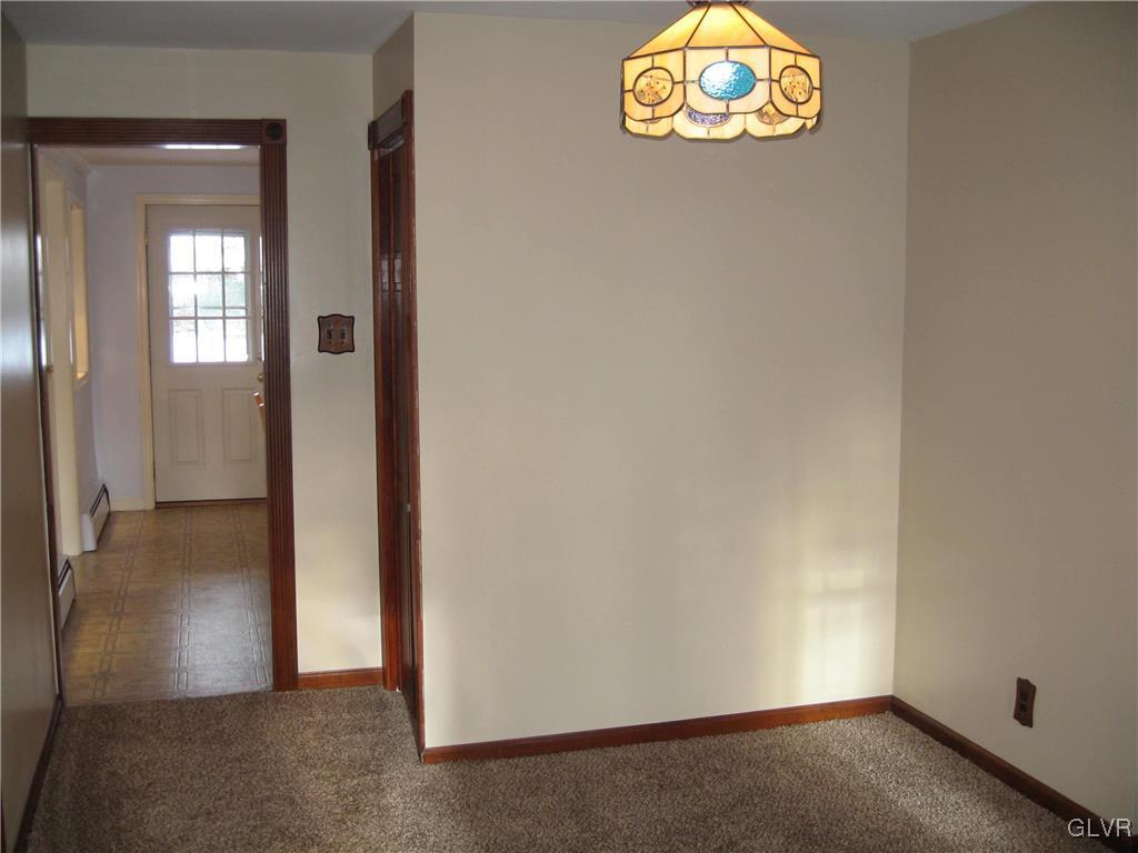 2009 Springtown Hill Road Hellertown, PA 18055 - Photo 14 of 39 an empty room with windows and fireplace