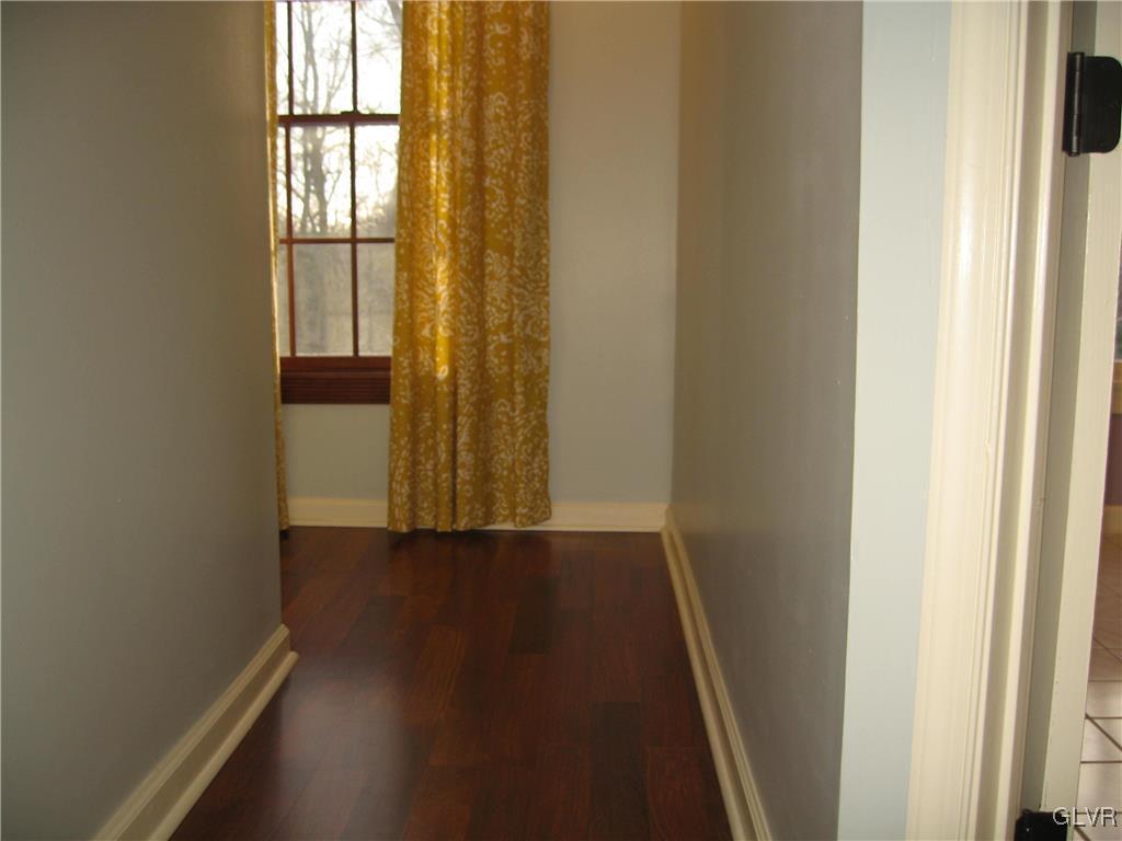 2009 Springtown Hill Road Hellertown, PA 18055 - Photo 36 of 39 an empty room with wooden floor and windows