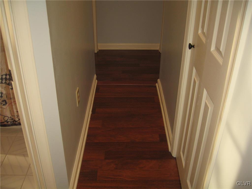 2009 Springtown Hill Road Hellertown, PA 18055 - Photo 37 of 39 a view of staircase with wooden floor and white door