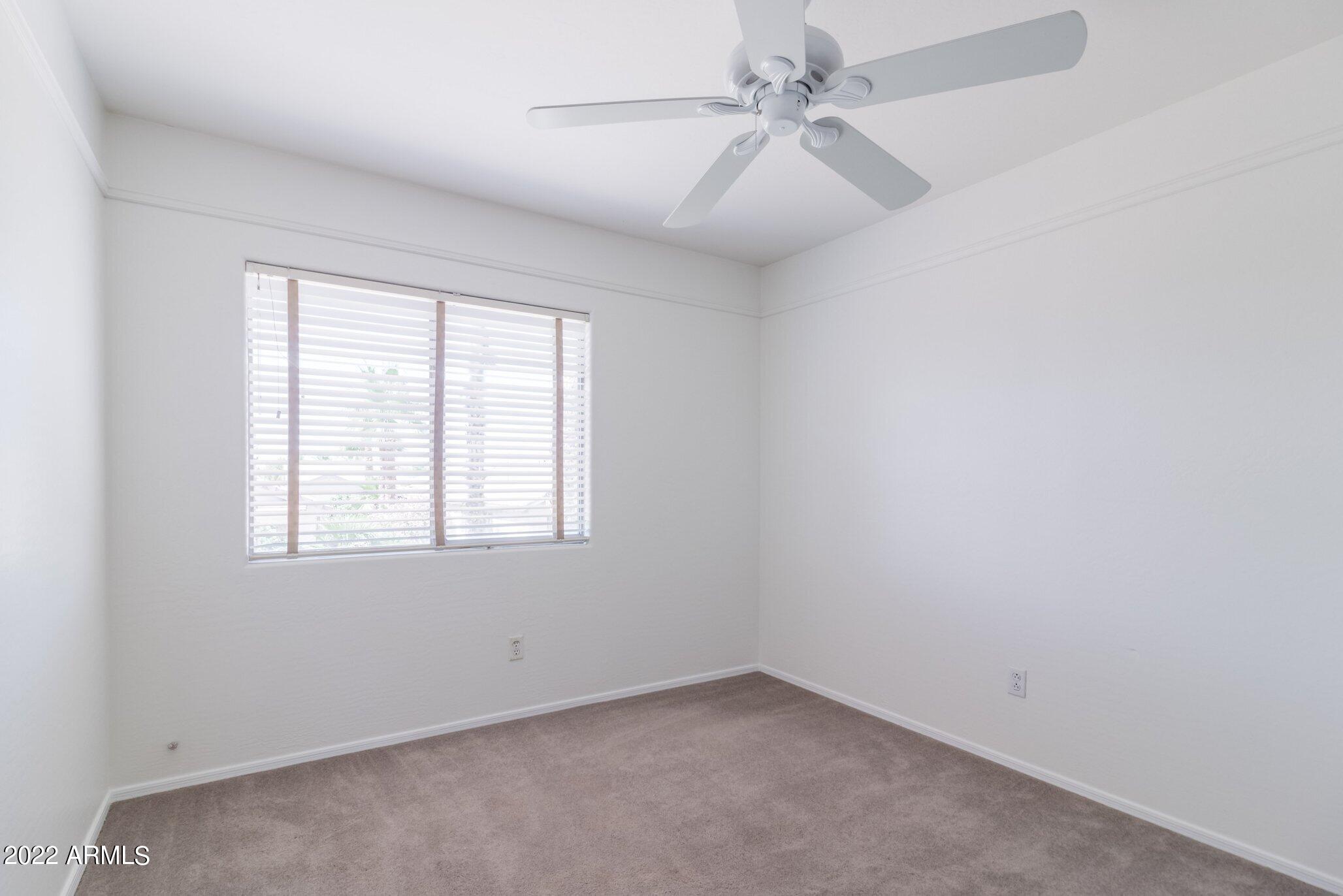16784 West Southampton Road Surprise, AZ 85374 - Photo 20 of 33 Bedroom