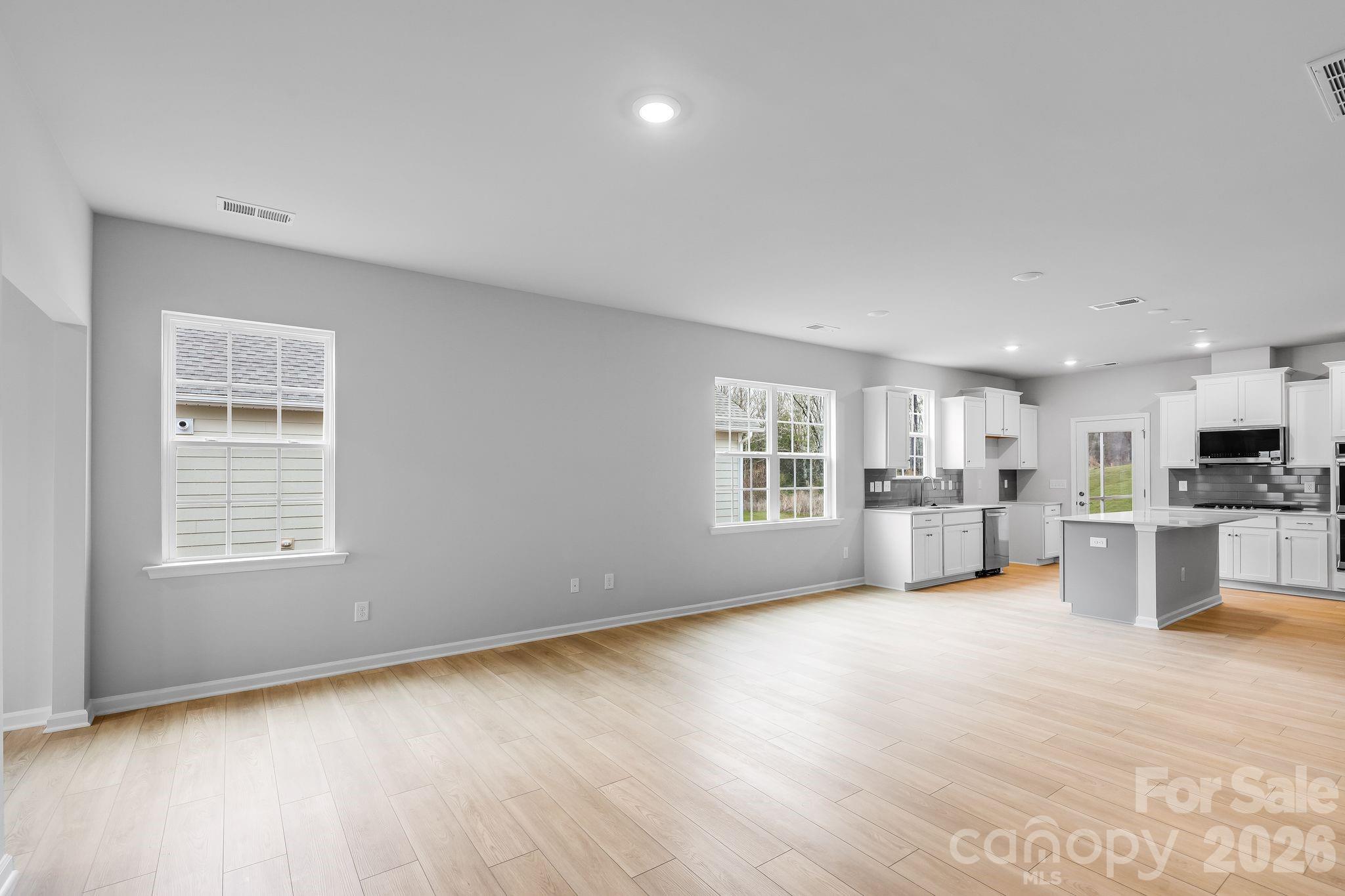3308 Amarillo Court, Unit 344 Lancaster, SC 29720 - Photo 12 of 27 a view of an empty room with a window
