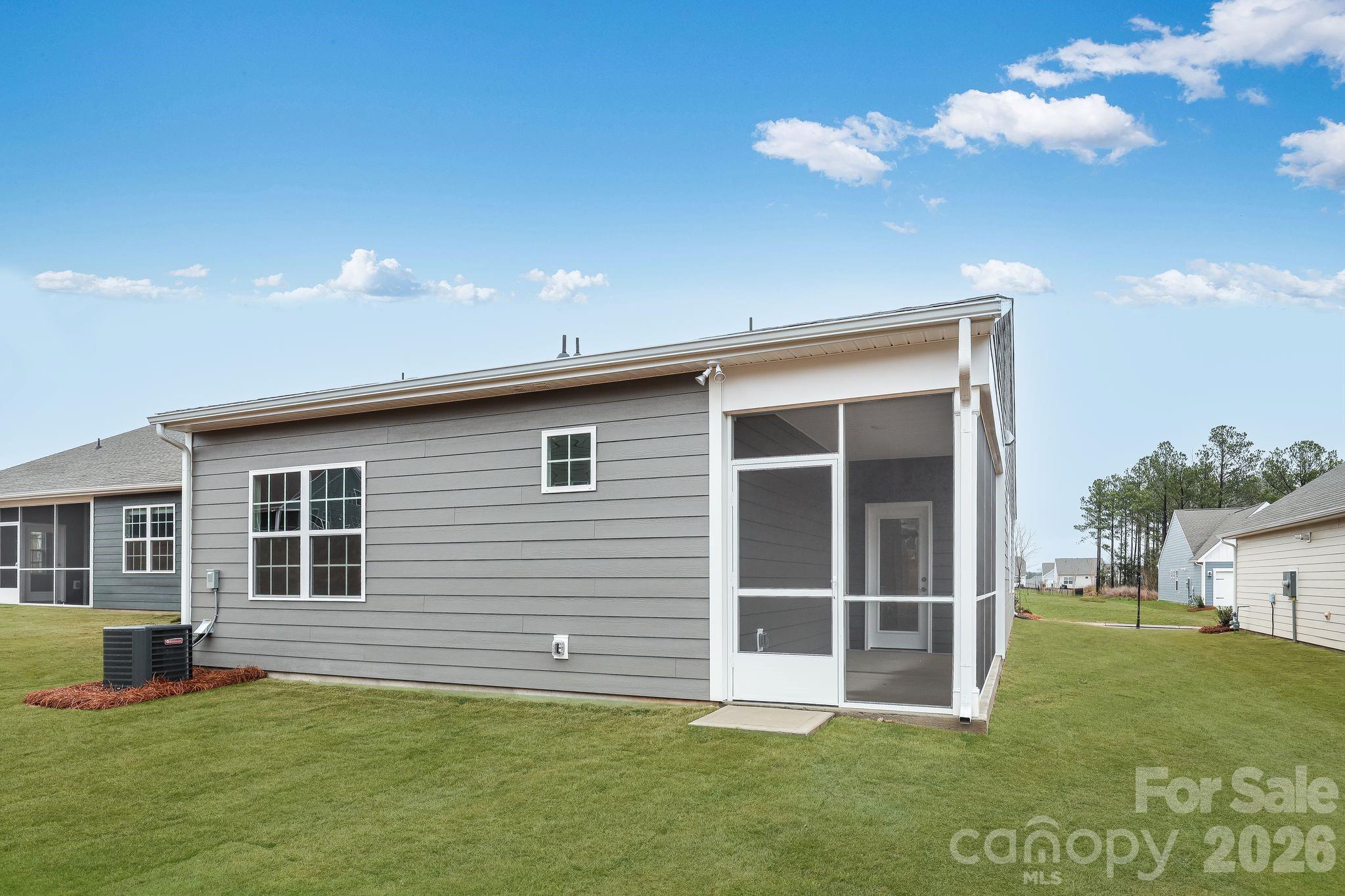 3308 Amarillo Court, Unit 344 Lancaster, SC 29720 - Photo 2 of 27 a view of a house with a yard