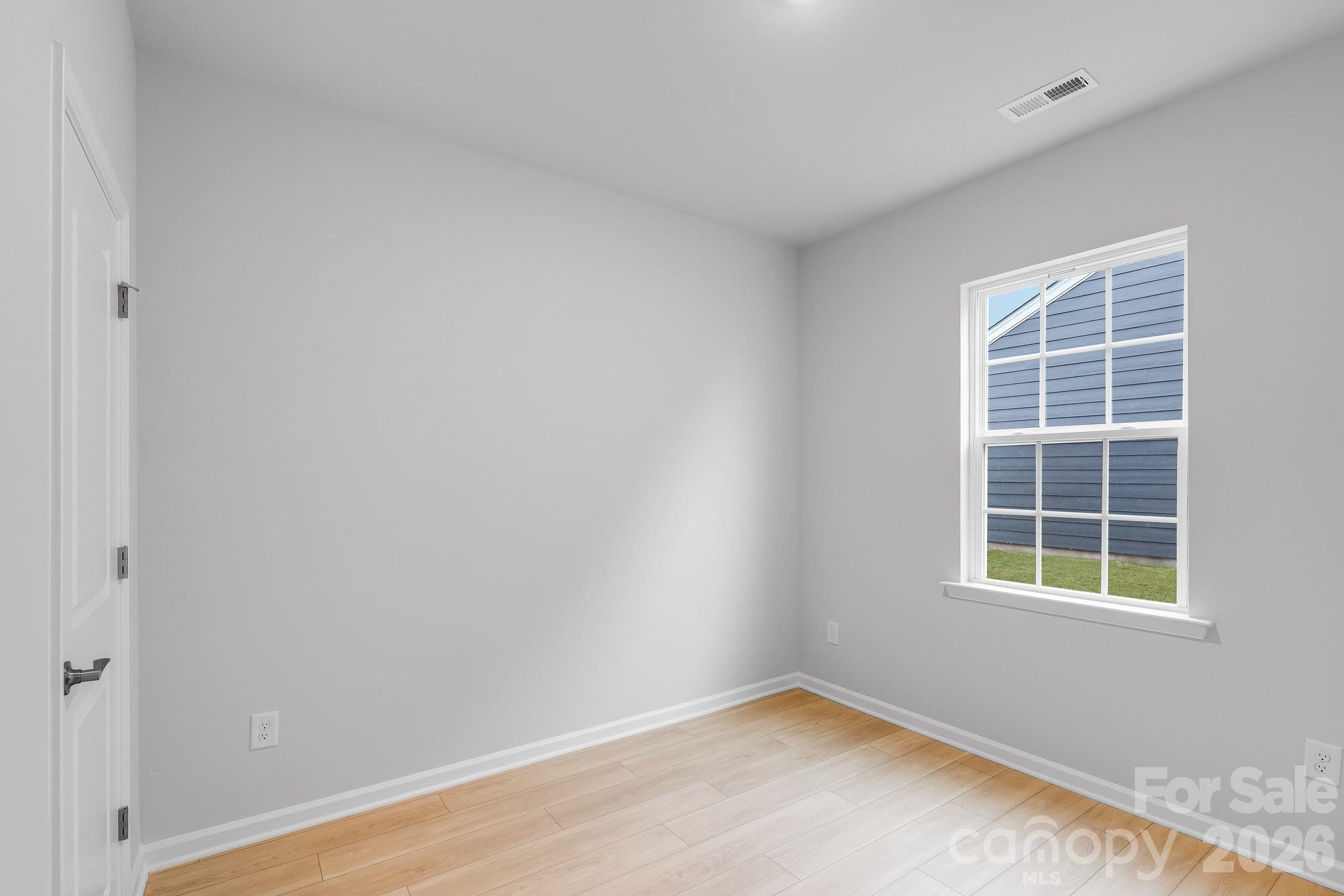 3308 Amarillo Court, Unit 344 Lancaster, SC 29720 - Photo 4 of 27 an empty room with a window