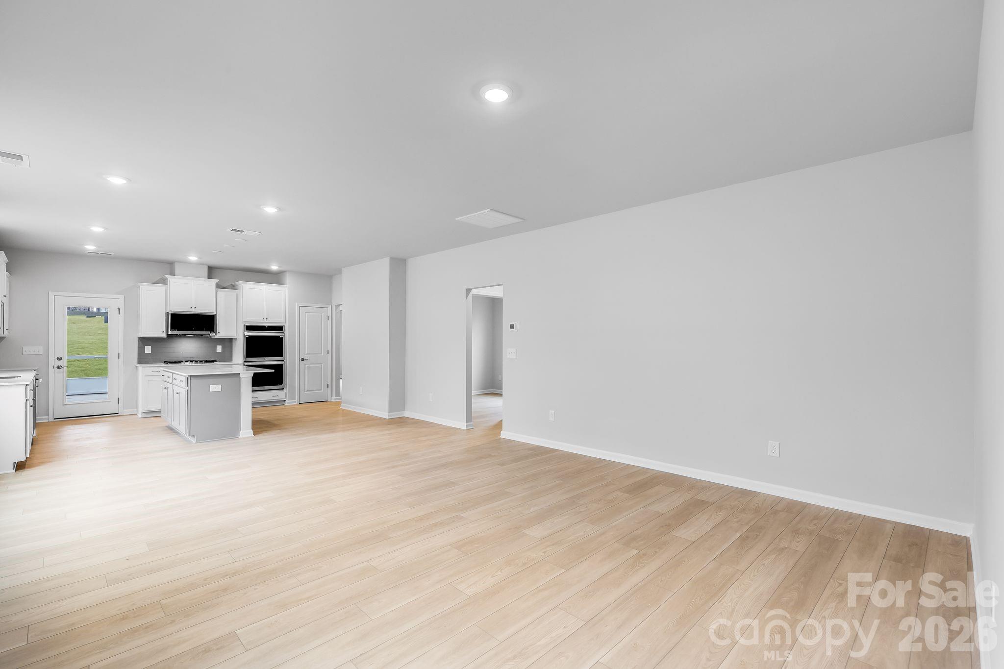 3308 Amarillo Court, Unit 344 Lancaster, SC 29720 - Photo 10 of 27 a view of kitchen with kitchen island and stainless steel appliances