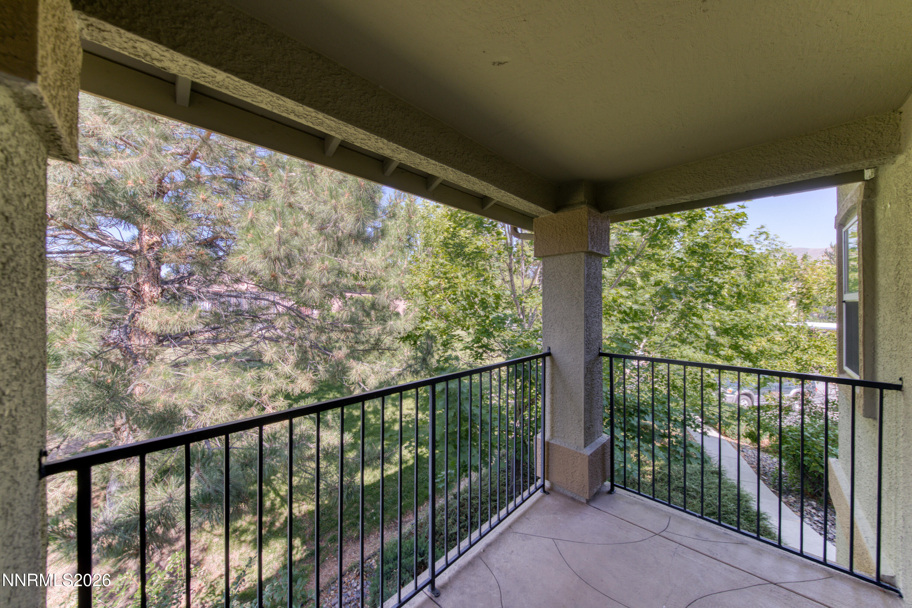 6850 Sharlands Avenue, Unit E 2022 Reno, NV 89523 - Photo 3 of 19 Covered deck 2