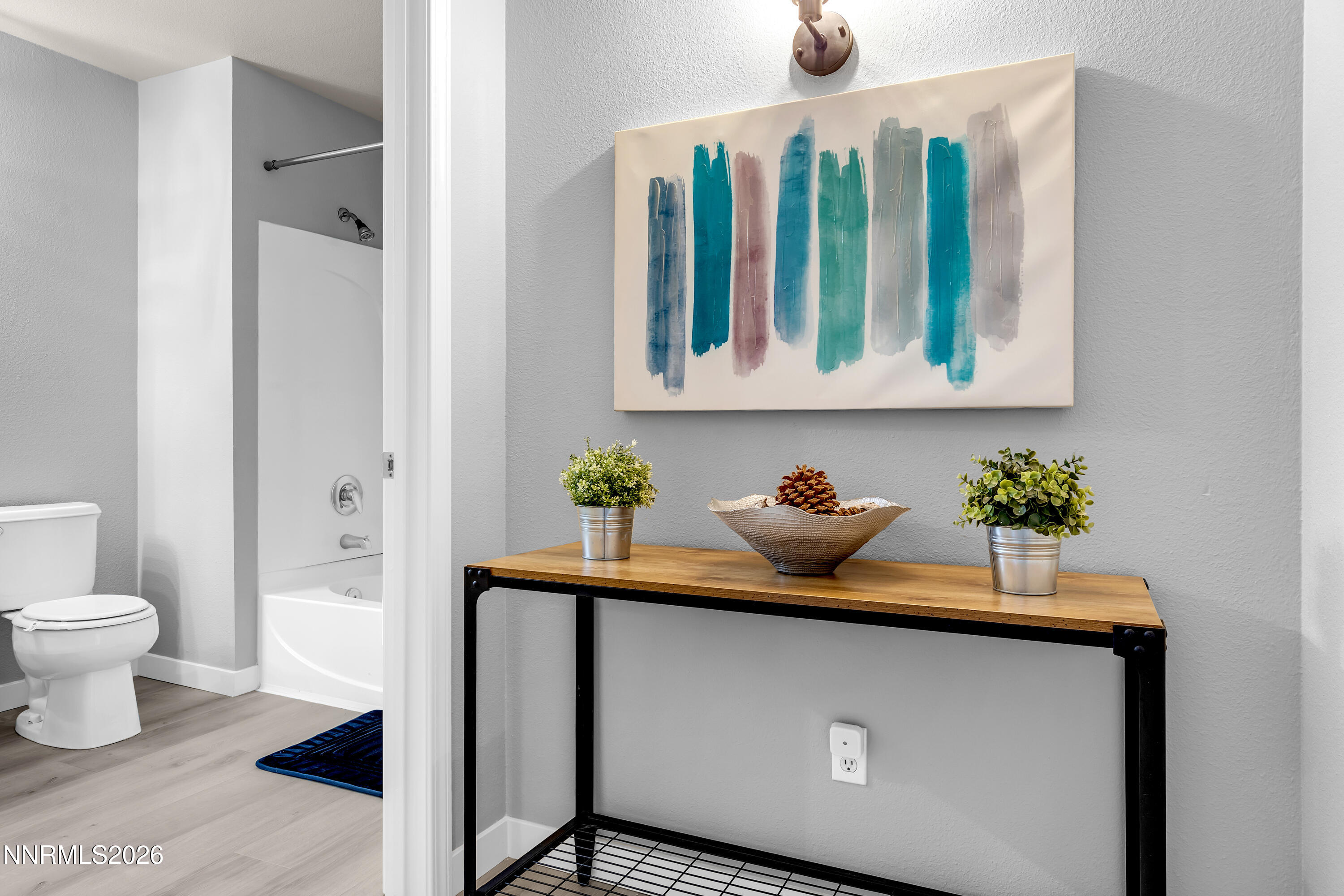 6850 Sharlands Avenue, Unit E 2022 Reno, NV 89523 - Photo 8 of 19 hallway to bath