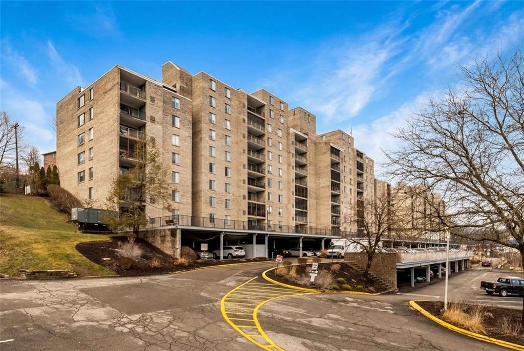2160 Greentree Road, Unit 405W Pittsburgh, PA 15220 - Photo 1 of 32 a city street lined with tall buildings