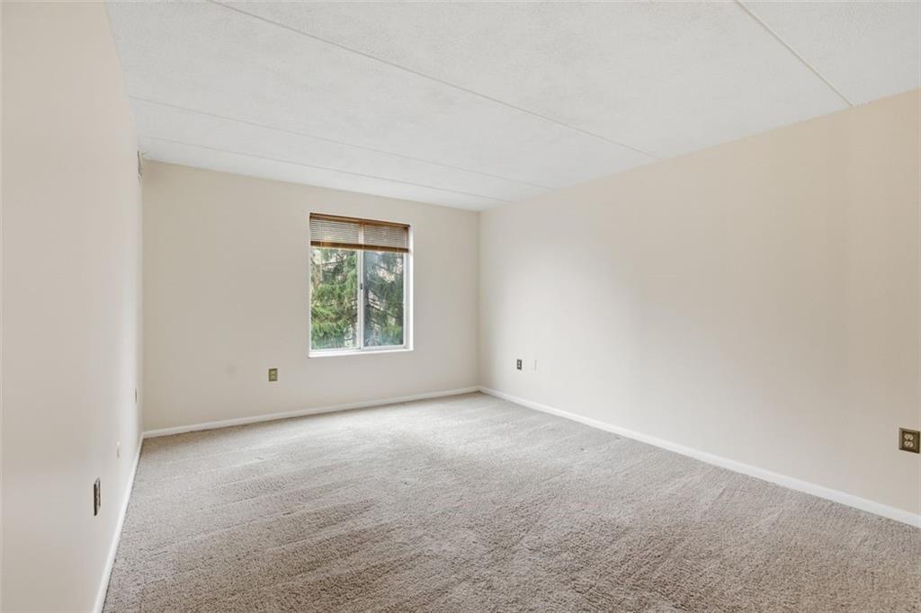 2160 Greentree Road, Unit 405W Pittsburgh, PA 15220 - Photo 20 of 32 an empty room with windows