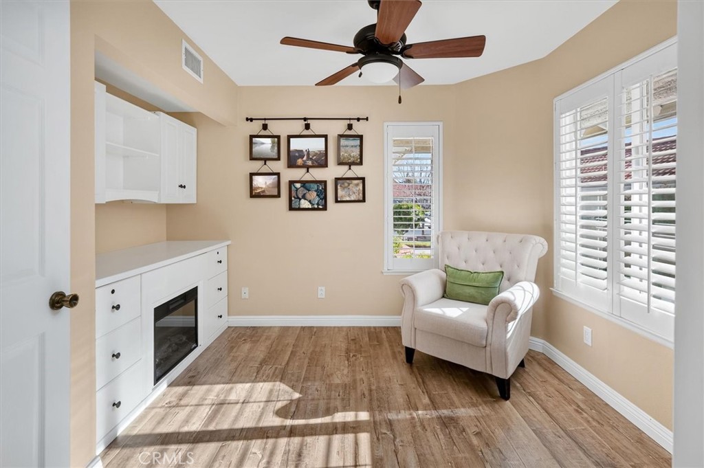 19447 Old Friend Road Canyon Country, CA 91351 - Photo 10 of 46 Downstairs Bedroom with built-ins and faux fireplace