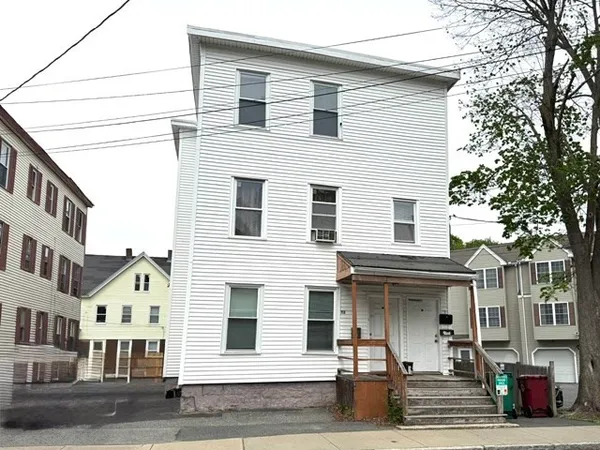 a front view of a building with a street