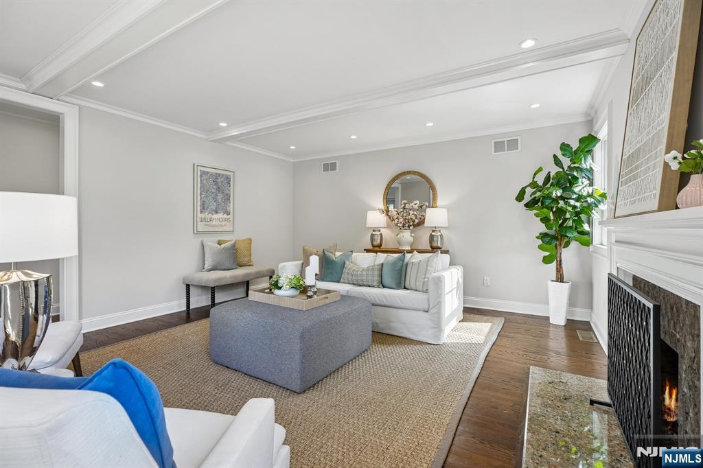 11 Mt Vernon Road Montclair, NJ 07043 - Photo 5 of 49 a living room with furniture and a fireplace