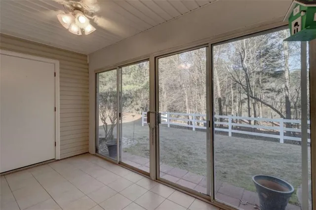a view of a hallway with a window