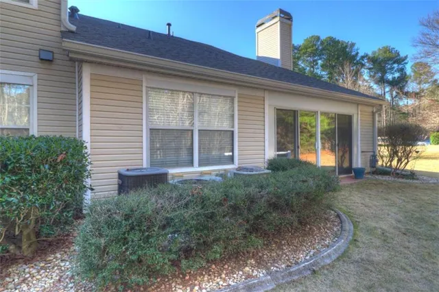 a house view with a backyard space