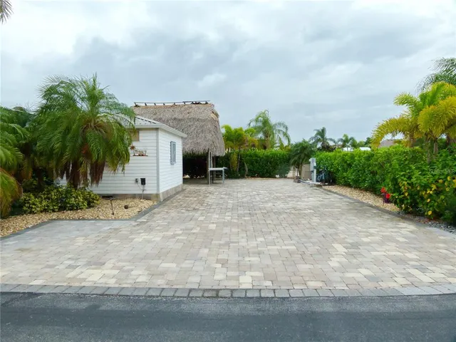 a view of a backyard with a garden
