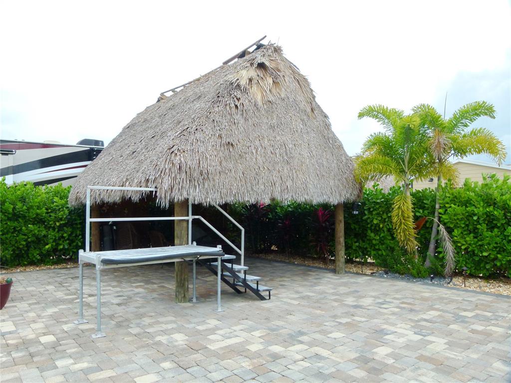 3520 Southwest 7th Manor, Unit 357 Okeechobee, FL 34974 - Photo 11 of 22 a backyard of a house with lots of green space