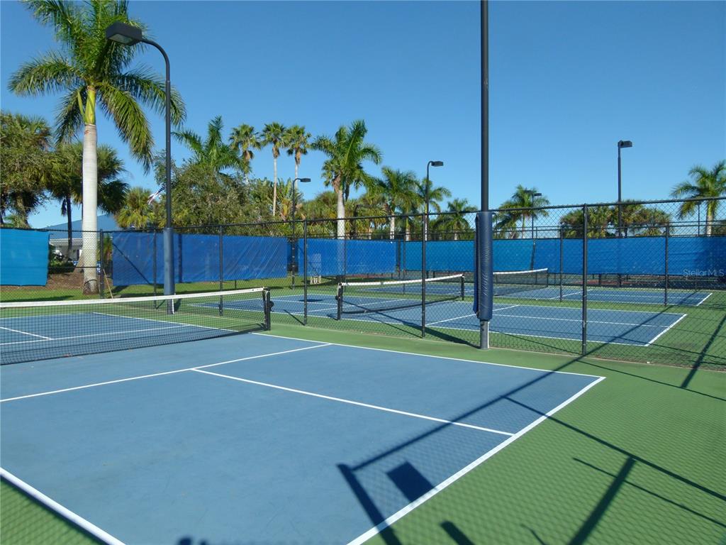 3520 Southwest 7th Manor, Unit 357 Okeechobee, FL 34974 - Photo 18 of 22 a view of a tennis court
