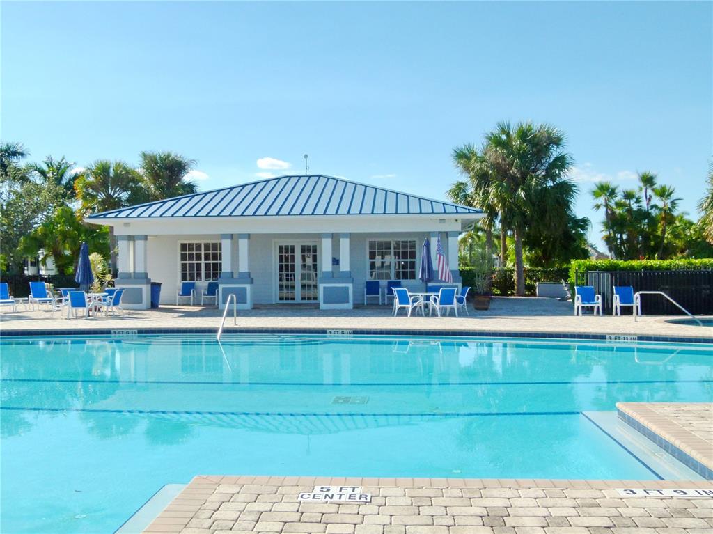 3520 Southwest 7th Manor, Unit 357 Okeechobee, FL 34974 - Photo 19 of 22 a view of a house with a swimming pool