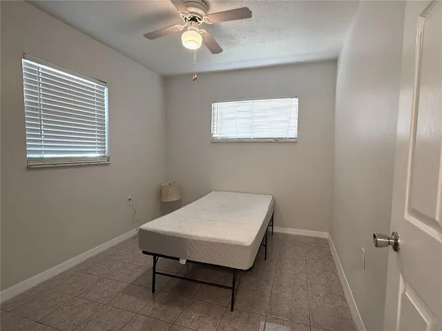 a room with a table and a window