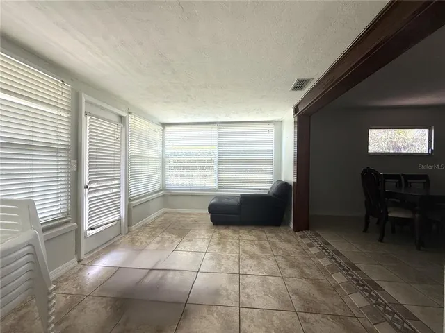 a living room with a large window
