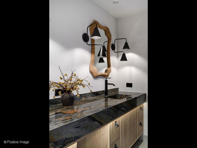 a view of a patio with couches table and chairs and potted plants