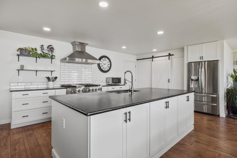 37368 Modoc Point Road Chiloquin, OR 97624 - Photo 15 of 44 Expansive Island with Soapstone Countertop & Storage