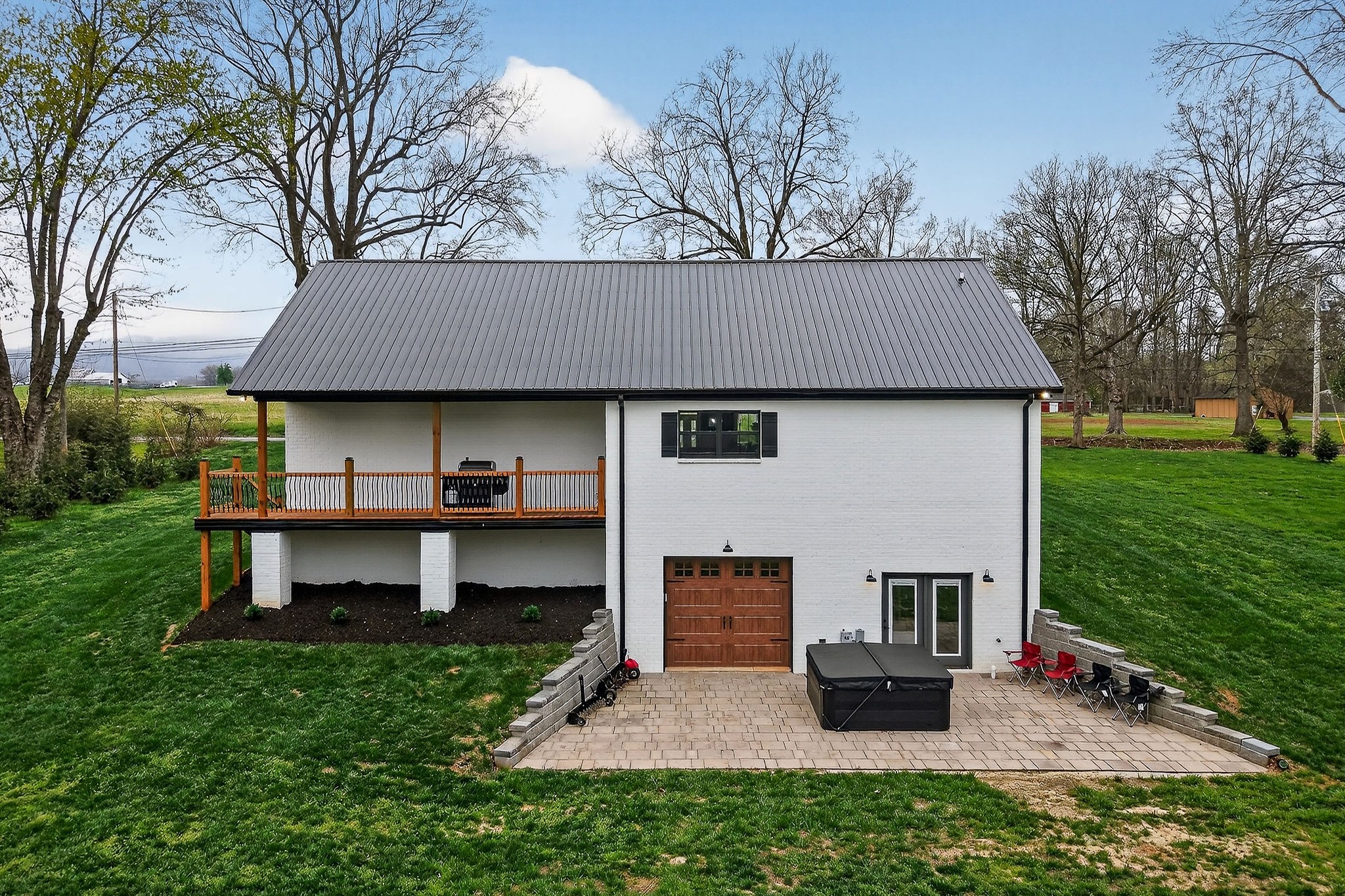 381 Rivercliff Road McMinnville, TN 37110 - Photo 22 of 46 a view of house with outdoor space and garden