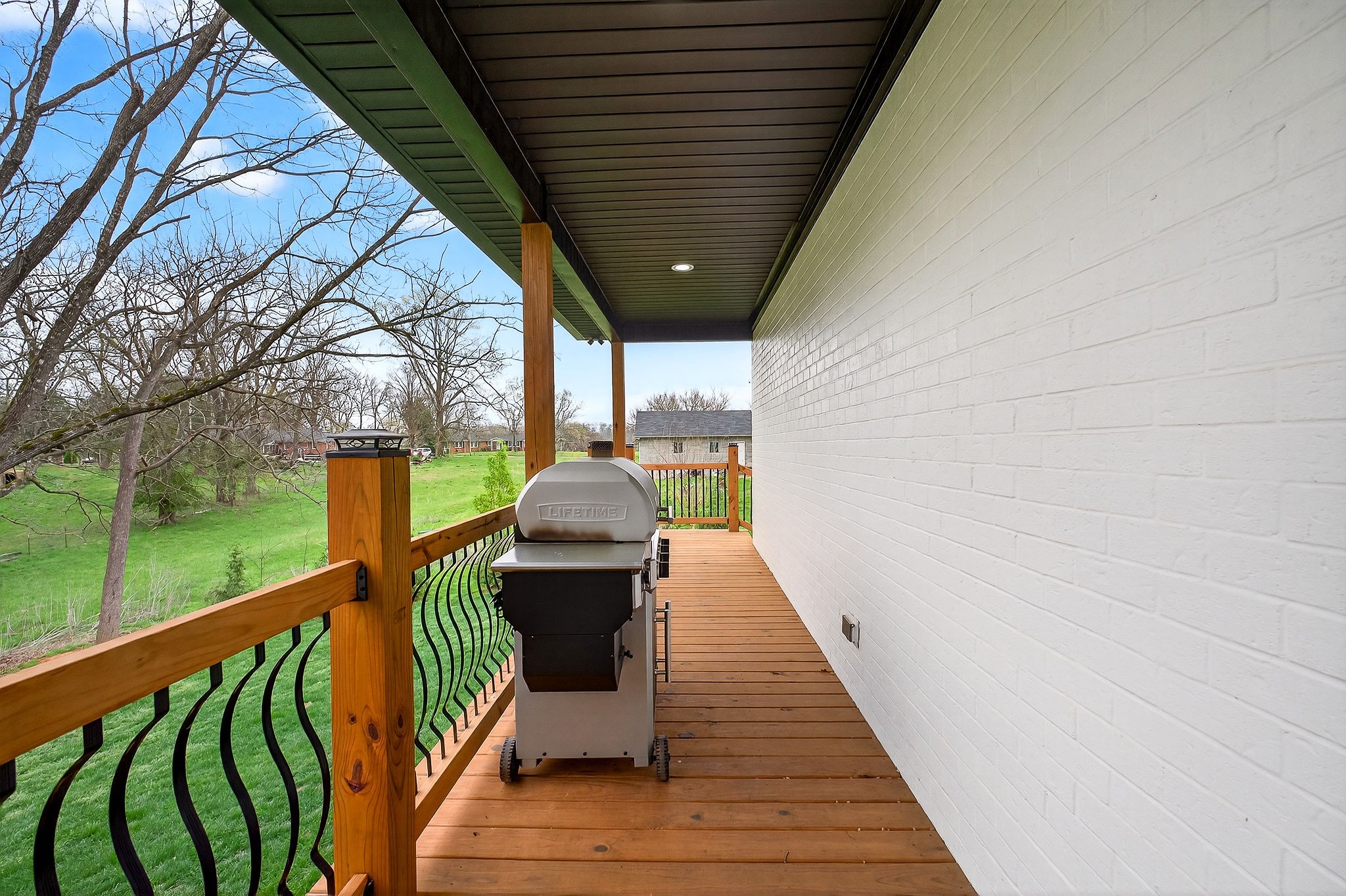 381 Rivercliff Road McMinnville, TN 37110 - Photo 28 of 46 a view of balcony with wooden floor