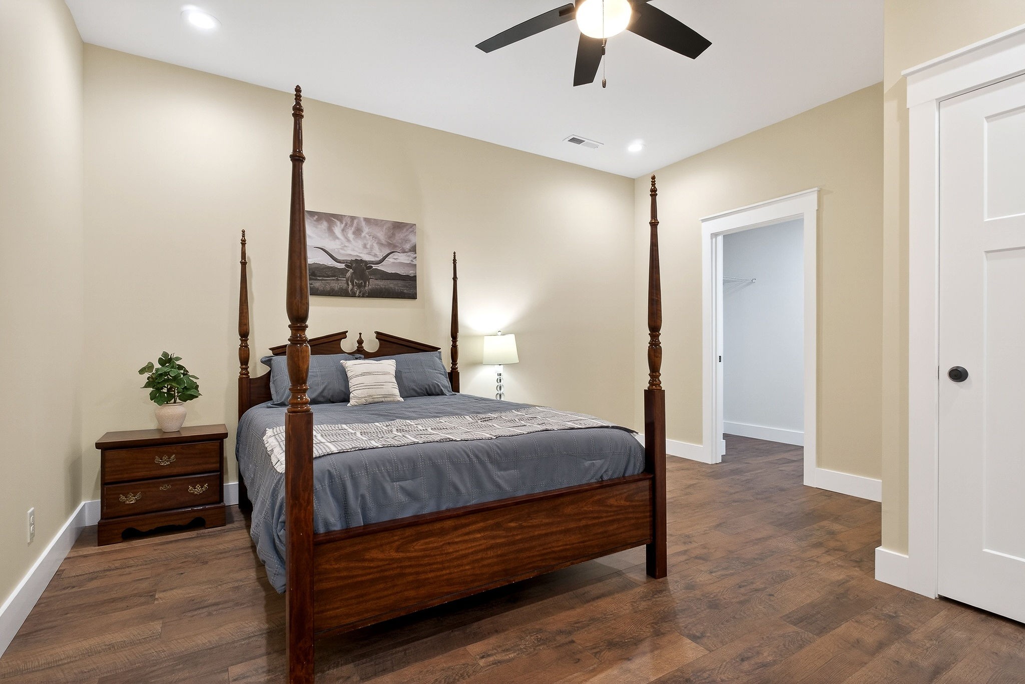 381 Rivercliff Road McMinnville, TN 37110 - Photo 33 of 46 a bedroom with a bed and a painting on the wall