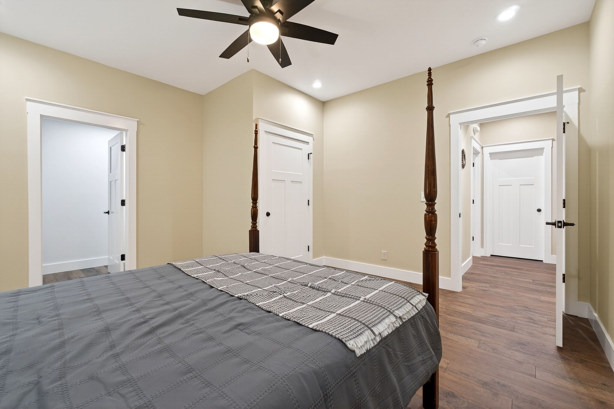 381 Rivercliff Road McMinnville, TN 37110 - Photo 34 of 46 a bedroom with a bed and a chandelier