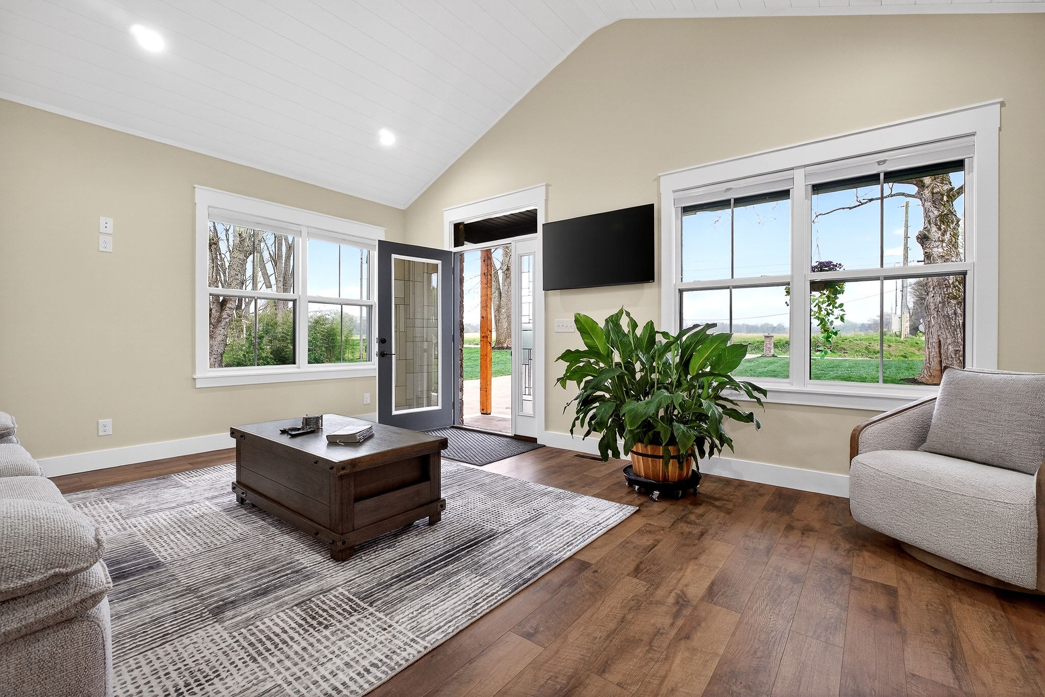 381 Rivercliff Road McMinnville, TN 37110 - Photo 5 of 46 a living room with furniture large window and flat screen tv