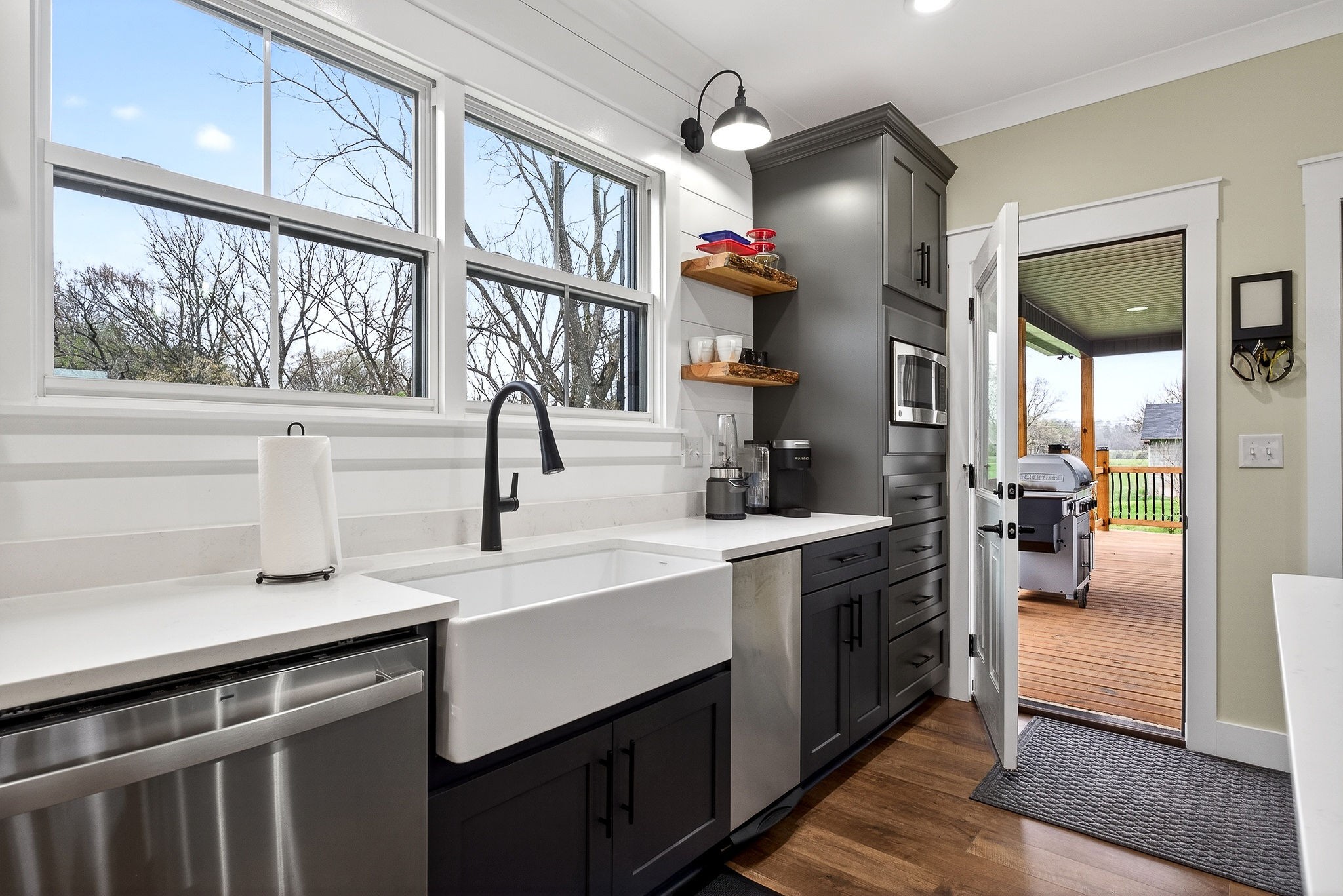 381 Rivercliff Road McMinnville, TN 37110 - Photo 6 of 46 a kitchen with a sink cabinets and window
