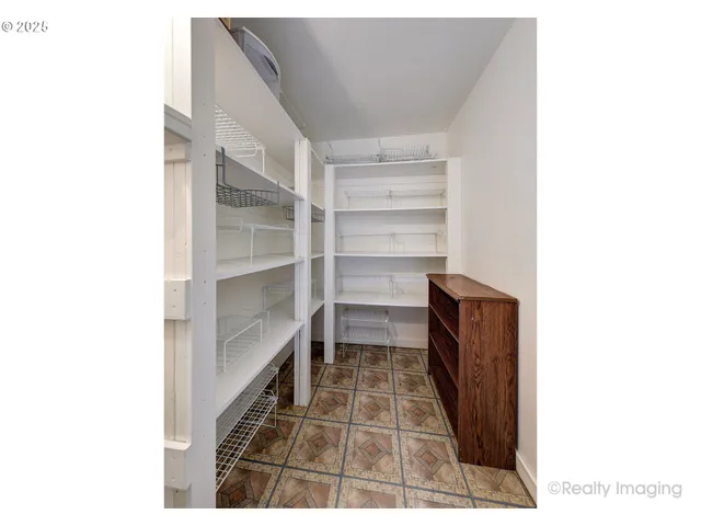 a view of a room with a cabinets