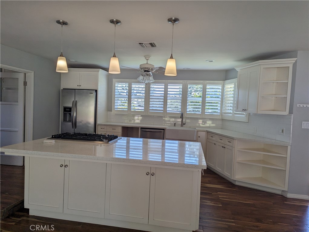 3745 Landfair Road Pasadena, CA 91107 - Photo 3 of 8 a kitchen with white cabinets and window