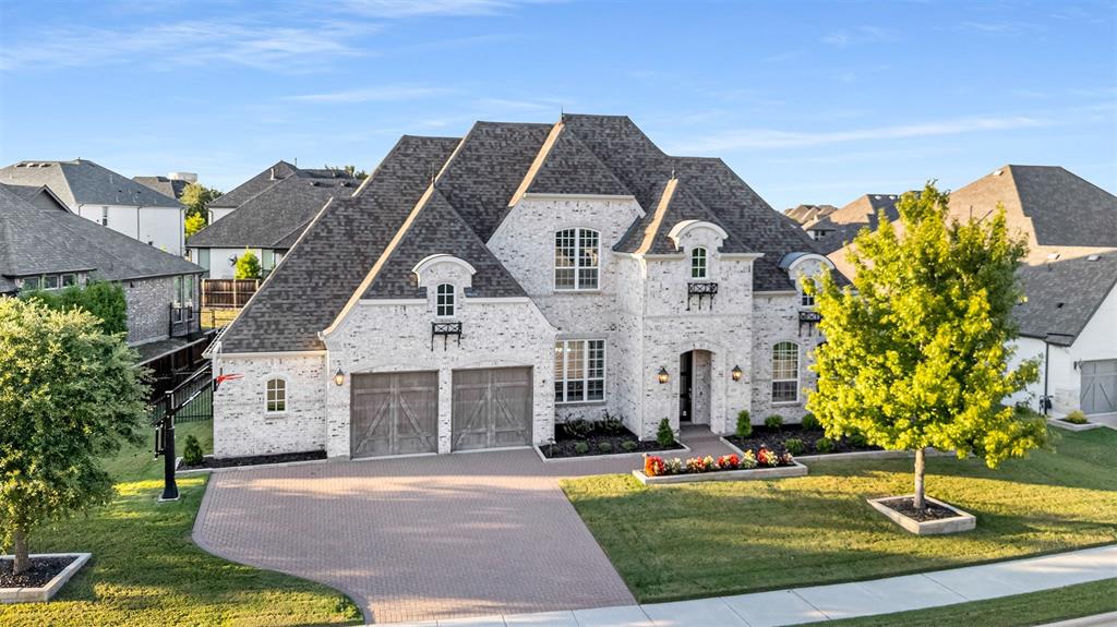 2201 Longmont Lane Prosper, TX 75078 - Photo 1 of 1 a front view of a house with a yard