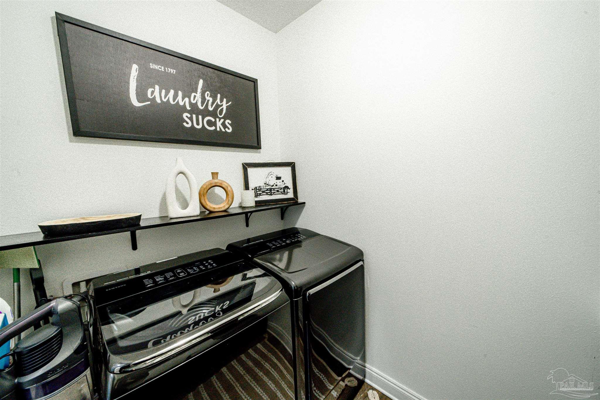 8165 Chumuckla Highway Pace, FL 32571 - Photo 32 of 50 a close view of stove top oven