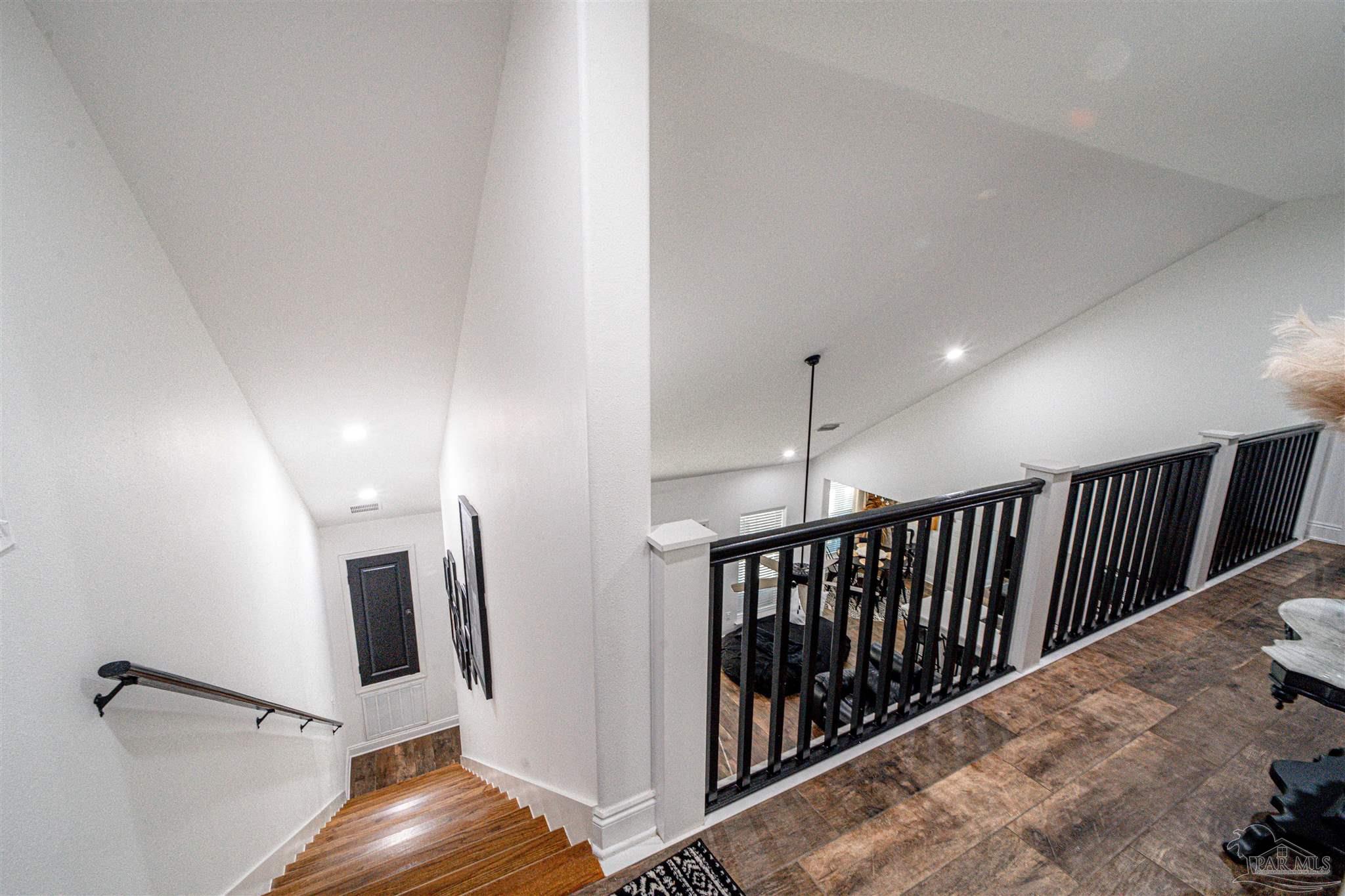 8165 Chumuckla Highway Pace, FL 32571 - Photo 33 of 50 a view of a hallway with stairs