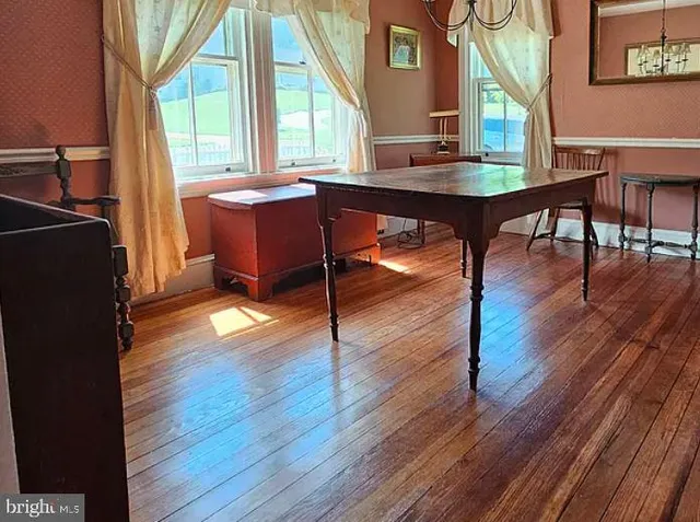 a kitchen with a stove a sink and a refrigerator