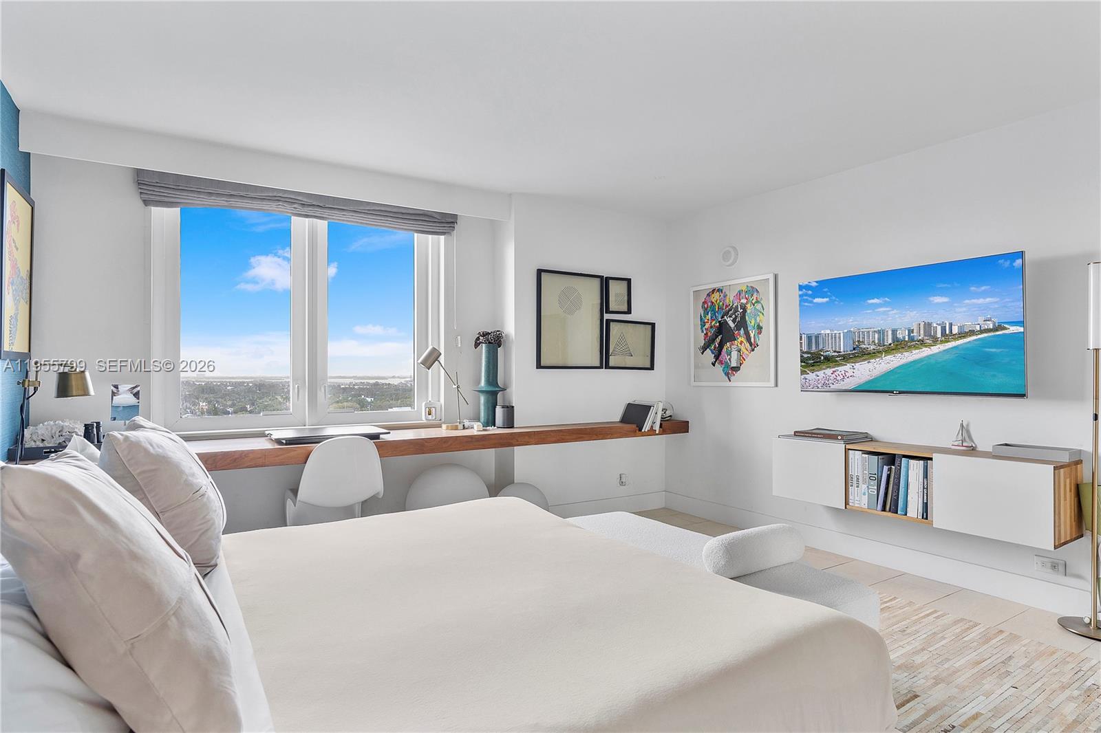 102 24th Street, Unit 1427 Miami Beach, FL 33139 - Photo 23 of 77 a bedroom with furniture and large window