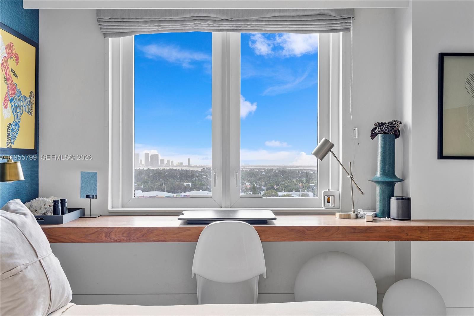 102 24th Street, Unit 1427 Miami Beach, FL 33139 - Photo 24 of 77 a living room with furniture and a large window