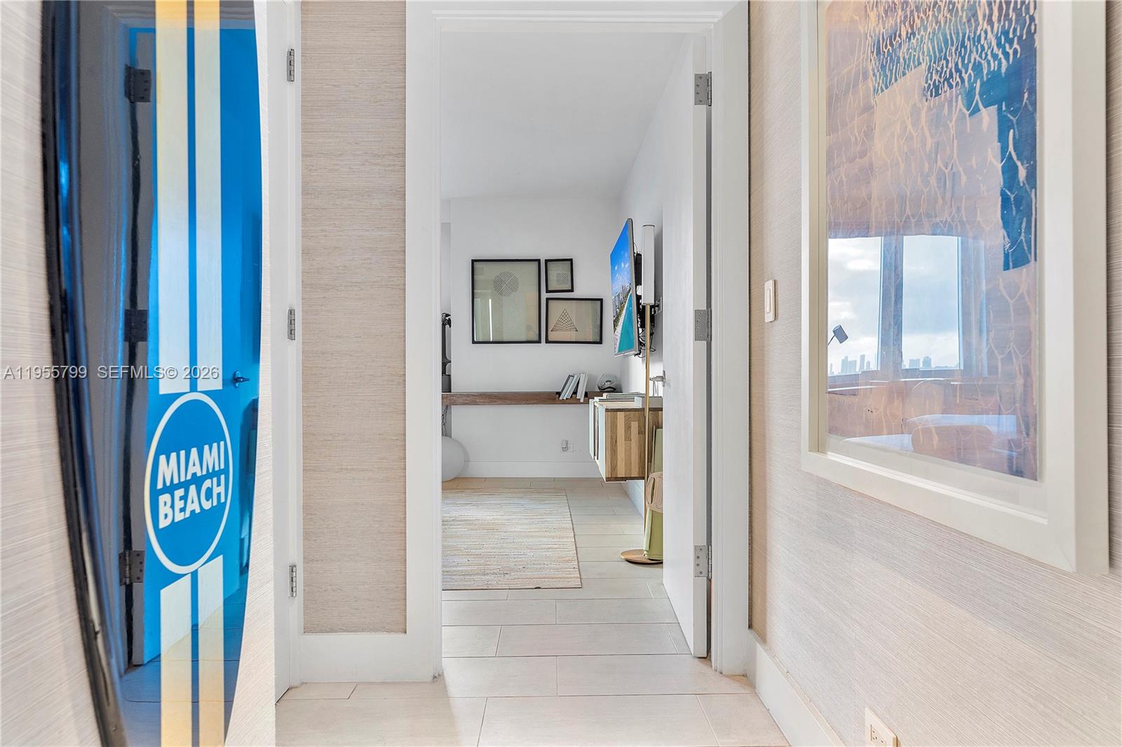 102 24th Street, Unit 1427 Miami Beach, FL 33139 - Photo 28 of 77 a bathroom with a tub and a view of bathroom