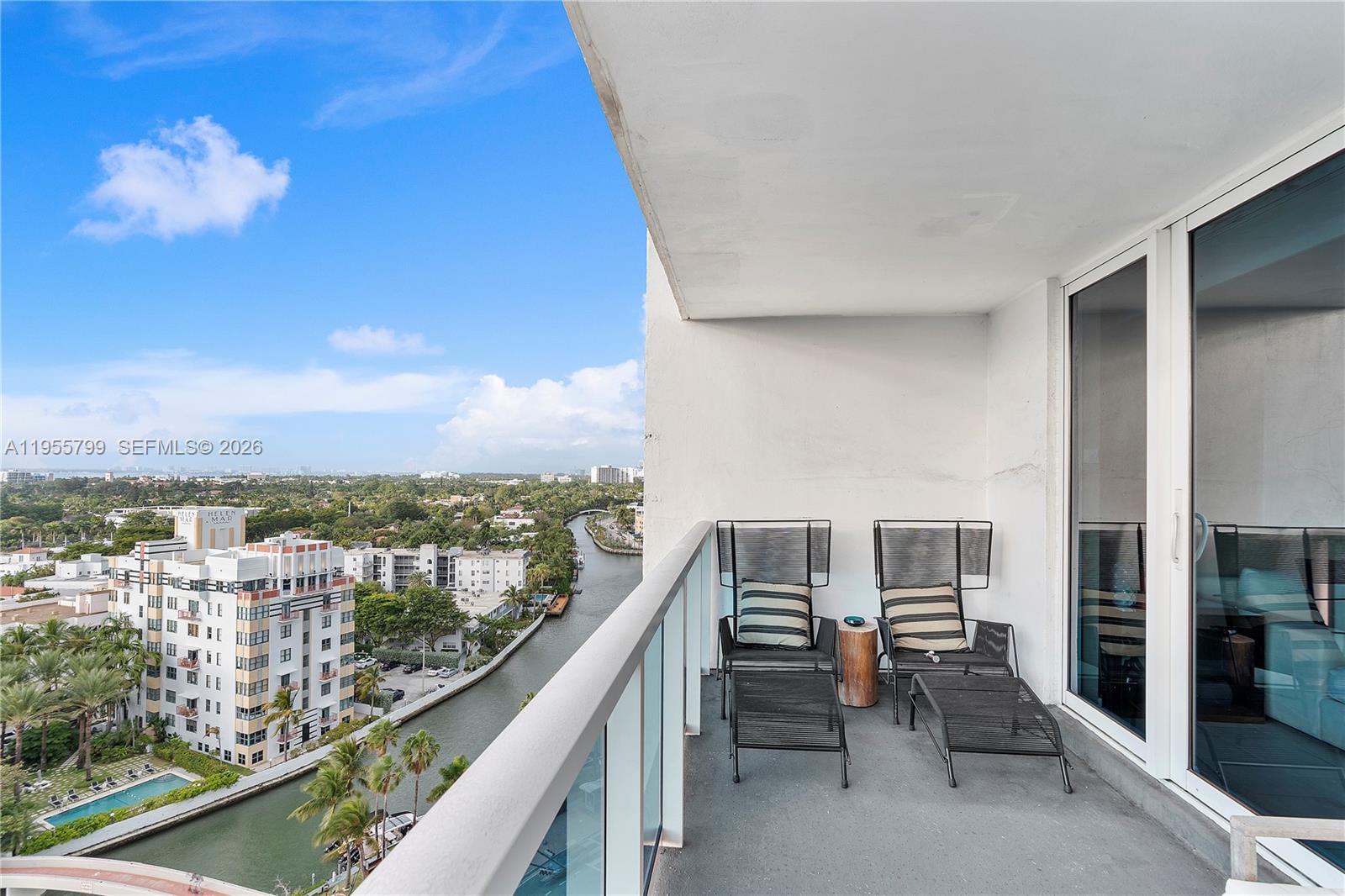 102 24th Street, Unit 1427 Miami Beach, FL 33139 - Photo 37 of 77 a view of a balcony with chairs