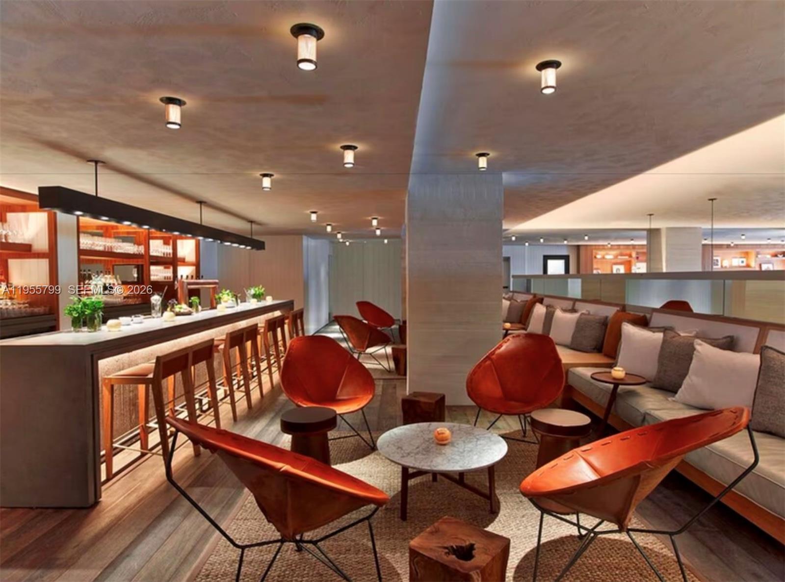 102 24th Street, Unit 1427 Miami Beach, FL 33139 - Photo 66 of 77 a living room with furniture kitchen view and a large window