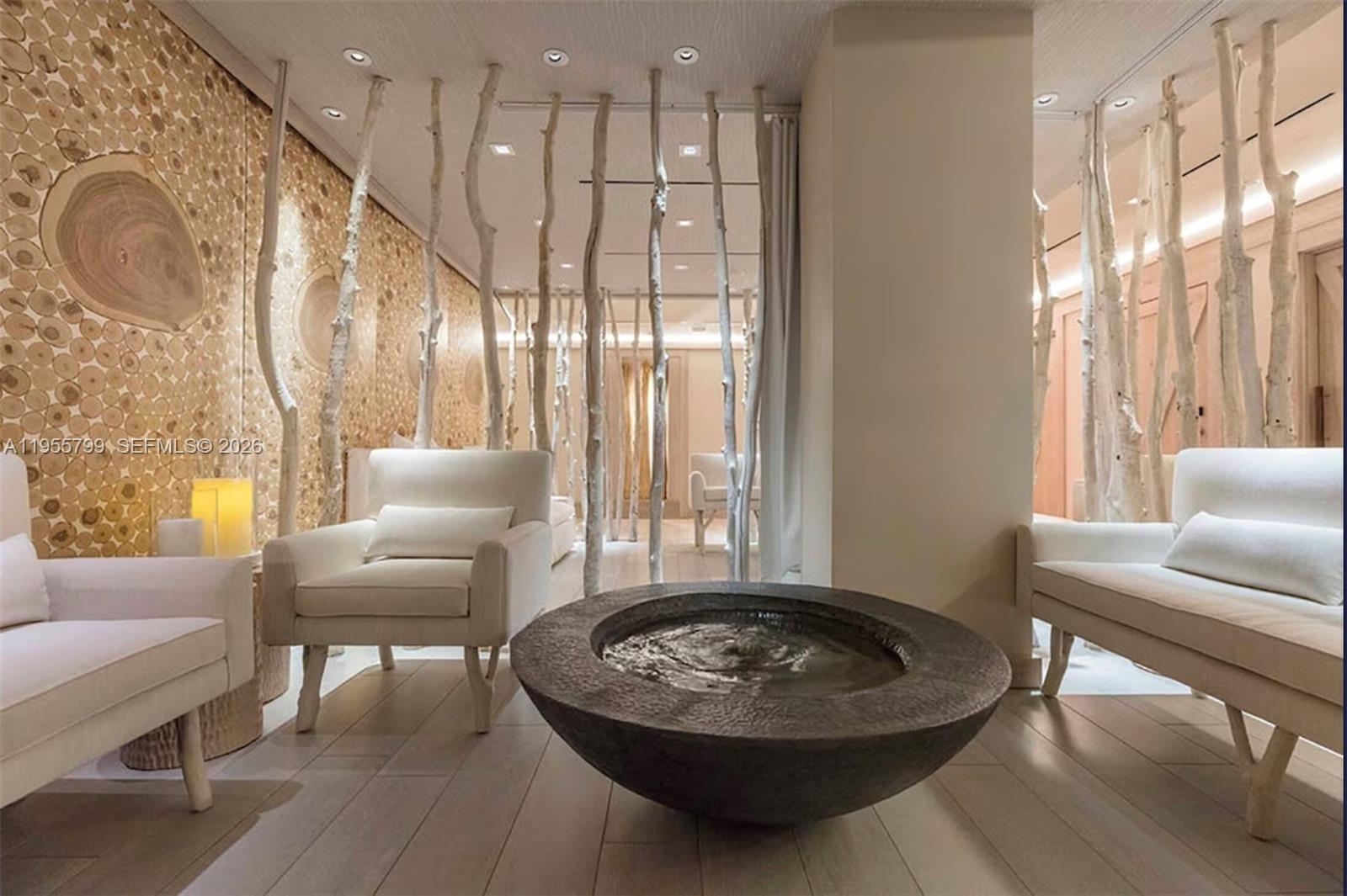 102 24th Street, Unit 1427 Miami Beach, FL 33139 - Photo 67 of 77 a living room with furniture and a large window