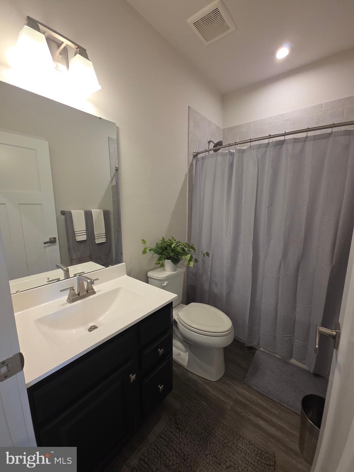 14510 Hunts Farm Road Brandywine, MD 20613 - Photo 66 of 74 a bathroom with a sink toilet and shower