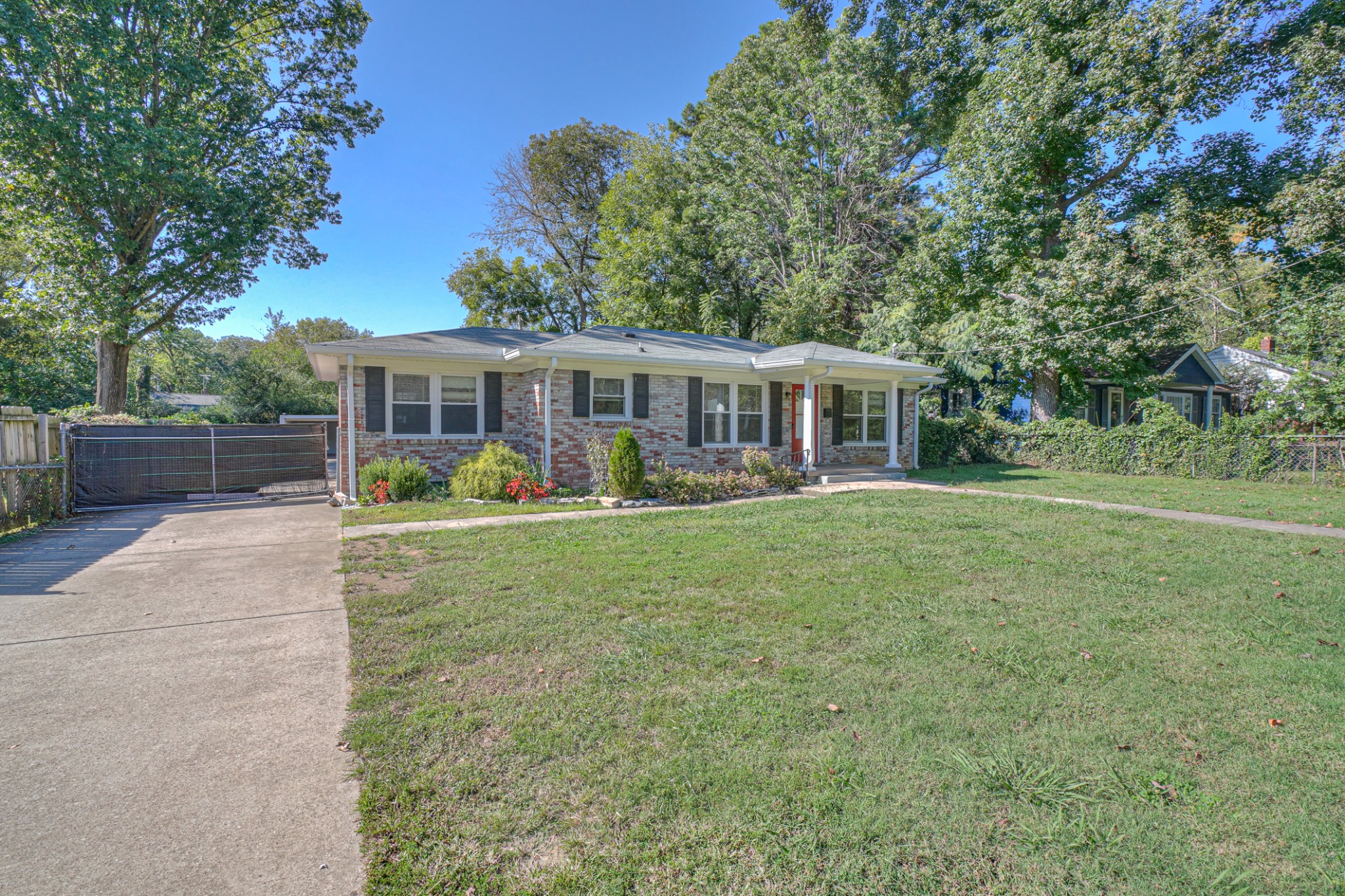 1827 Middle Tennessee Boulevard Murfreesboro, TN 37130 - Photo 1 of 21 front view of a house with a yard