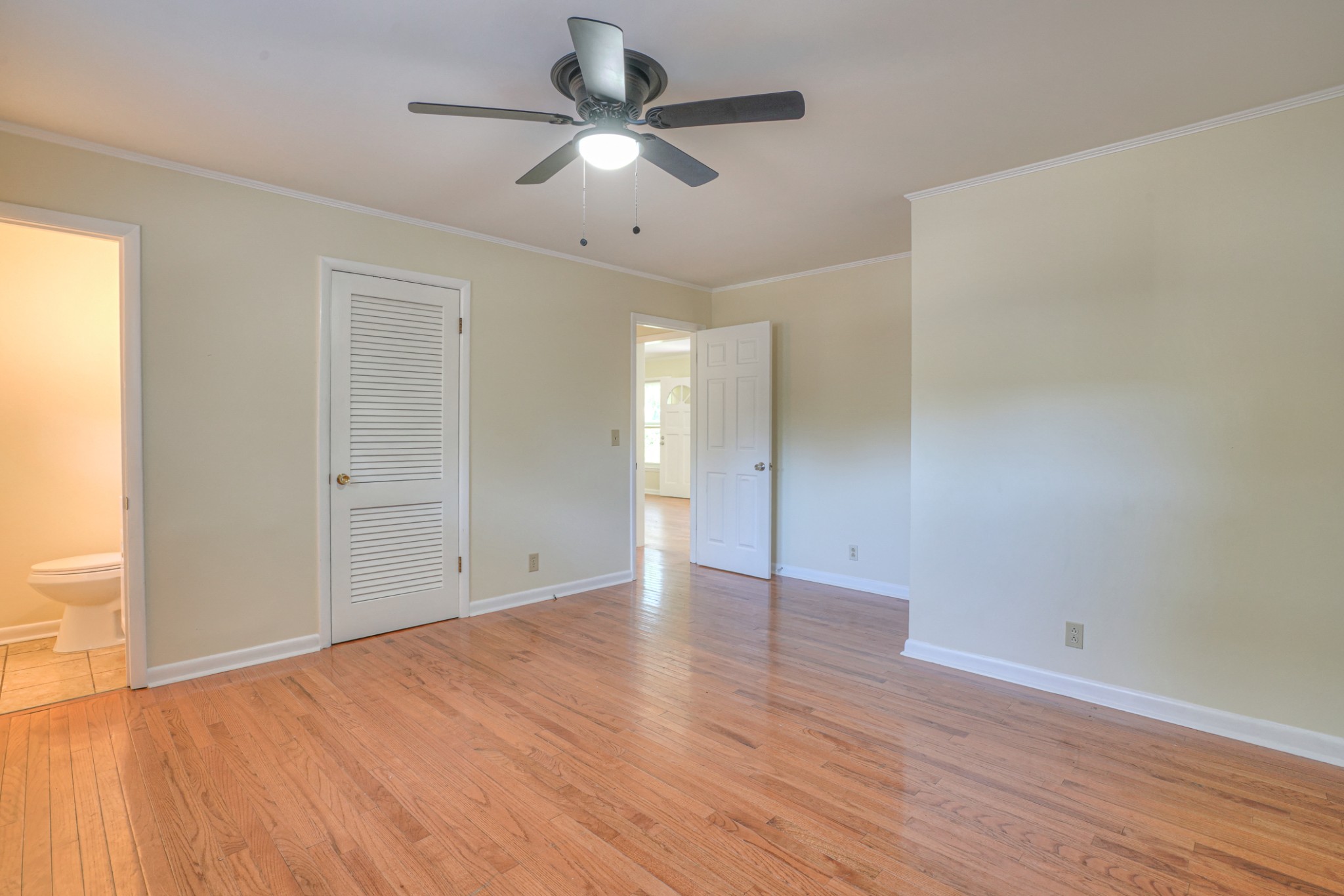 1827 Middle Tennessee Boulevard Murfreesboro, TN 37130 - Photo 12 of 21 an empty room with wooden floor and windows