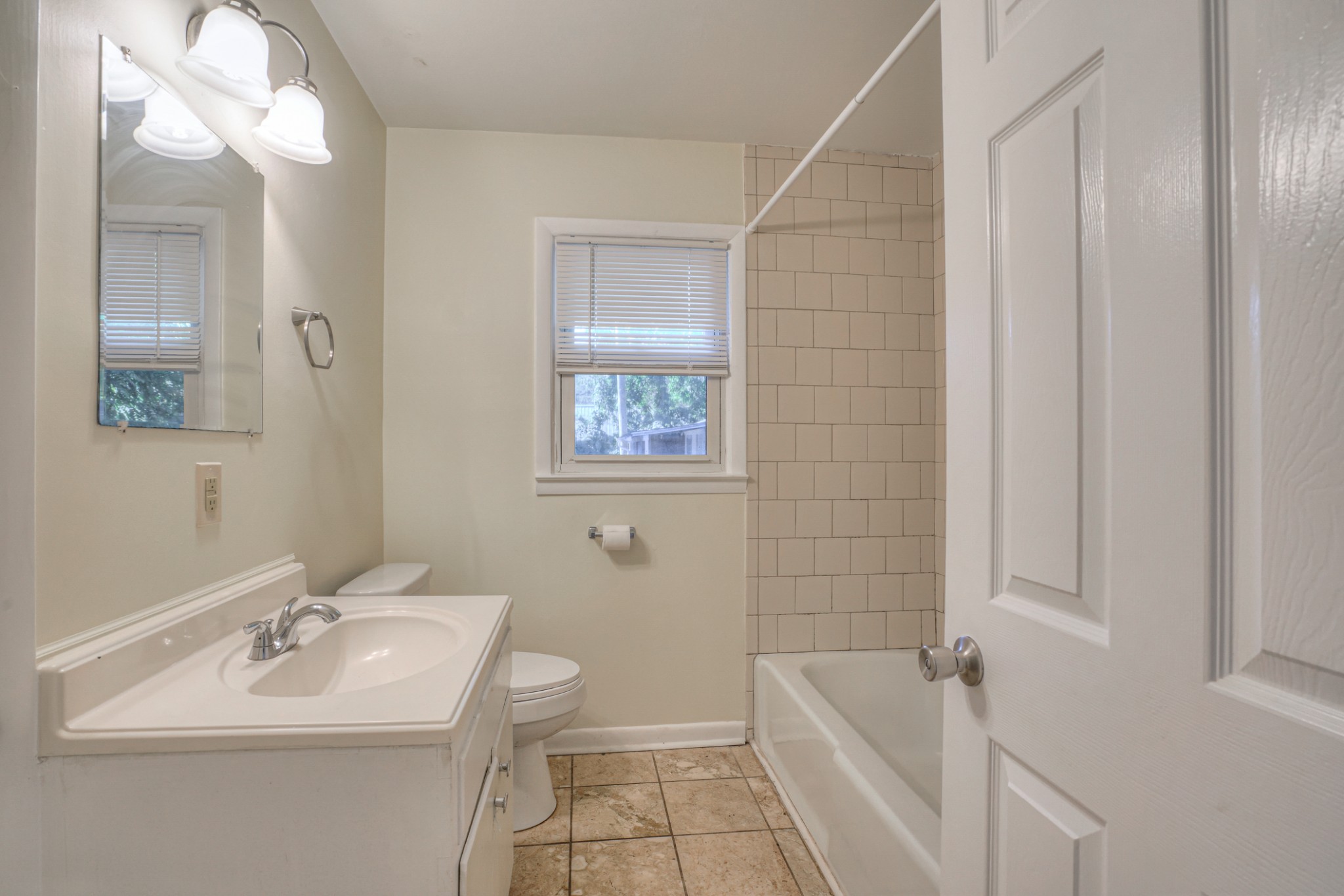 1827 Middle Tennessee Boulevard Murfreesboro, TN 37130 - Photo 14 of 21 a bathroom with a sink a toilet and shower