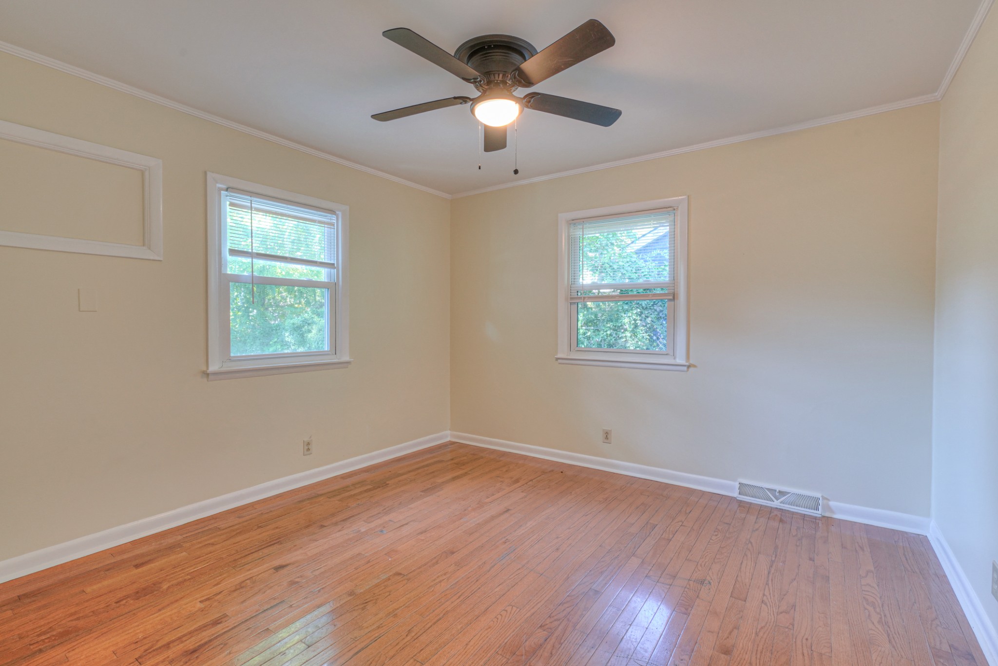 1827 Middle Tennessee Boulevard Murfreesboro, TN 37130 - Photo 15 of 21 a view of empty room with wooden floor and fan